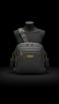 Muted brass-accented crossbody bag
